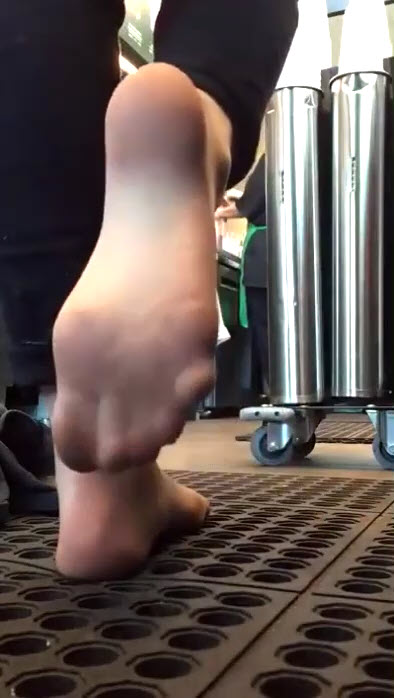 Barista tease shows off her sexy pantyhose feet